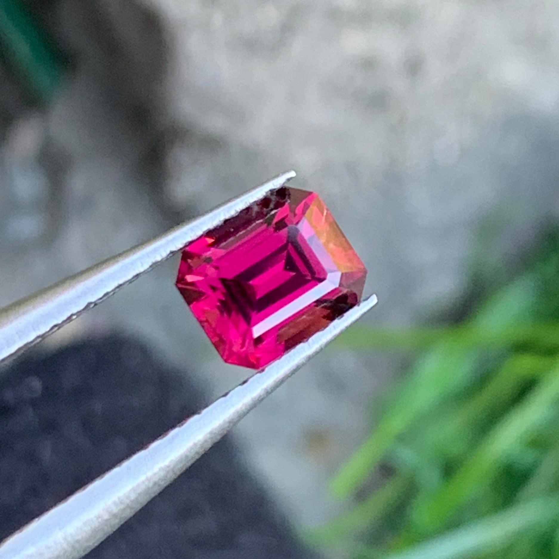 pinkish red gemstone