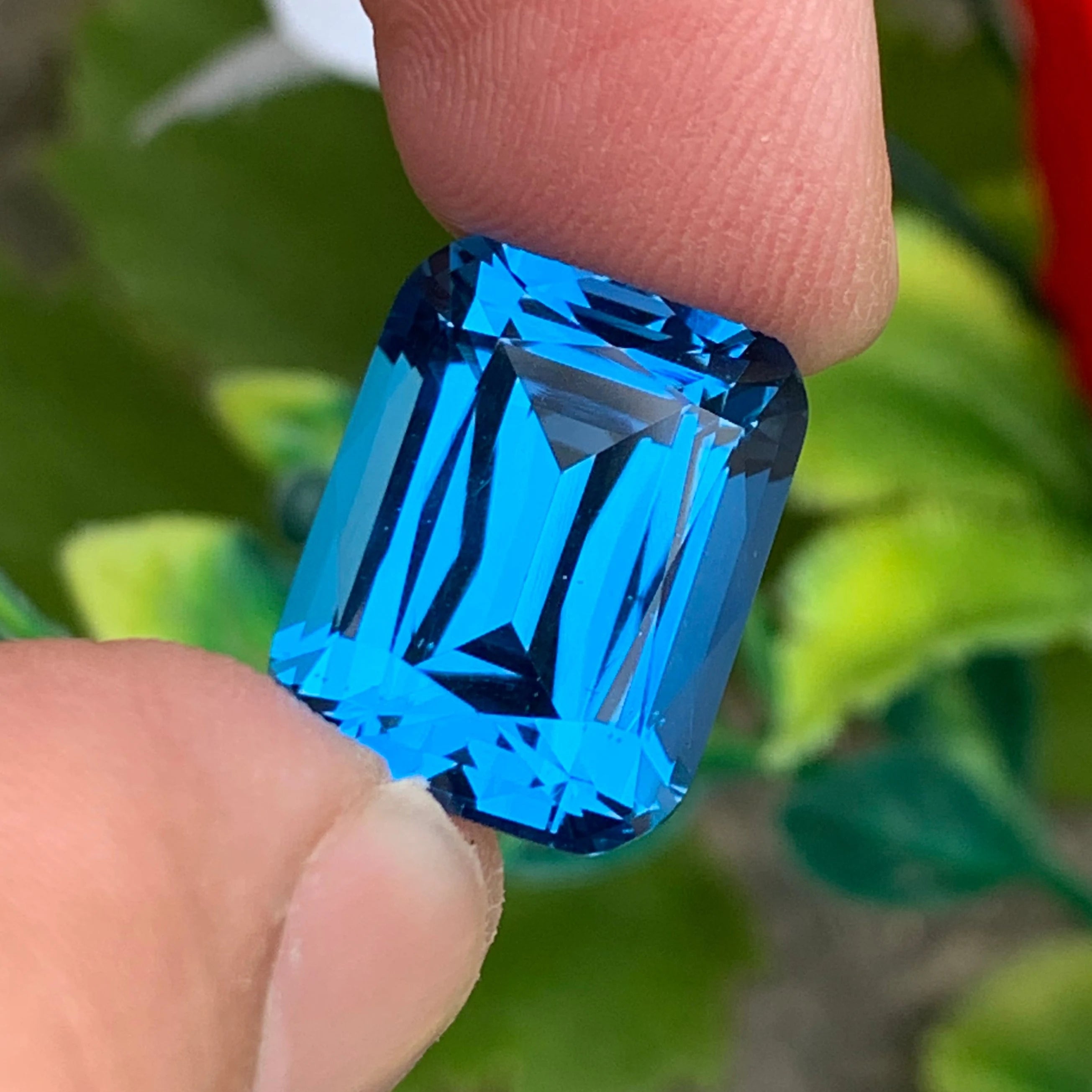 Electric Swiss Blue Topaz from Africa - 19.80 Carats Long Cushion
