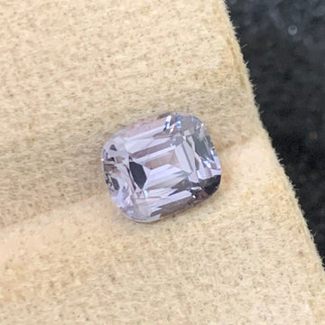 Natural spinel gemstone showing vivid color range Pinkish purple spinel gemstone close-up