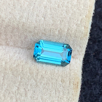Neon Blue Tourmaline 
Neon Blue Tourmaline jewelry
0.60 carat neon blue tourmaline emerald cut natural gemstone
Afghanistan neon blue tourmaline loupe clean gemstone close view