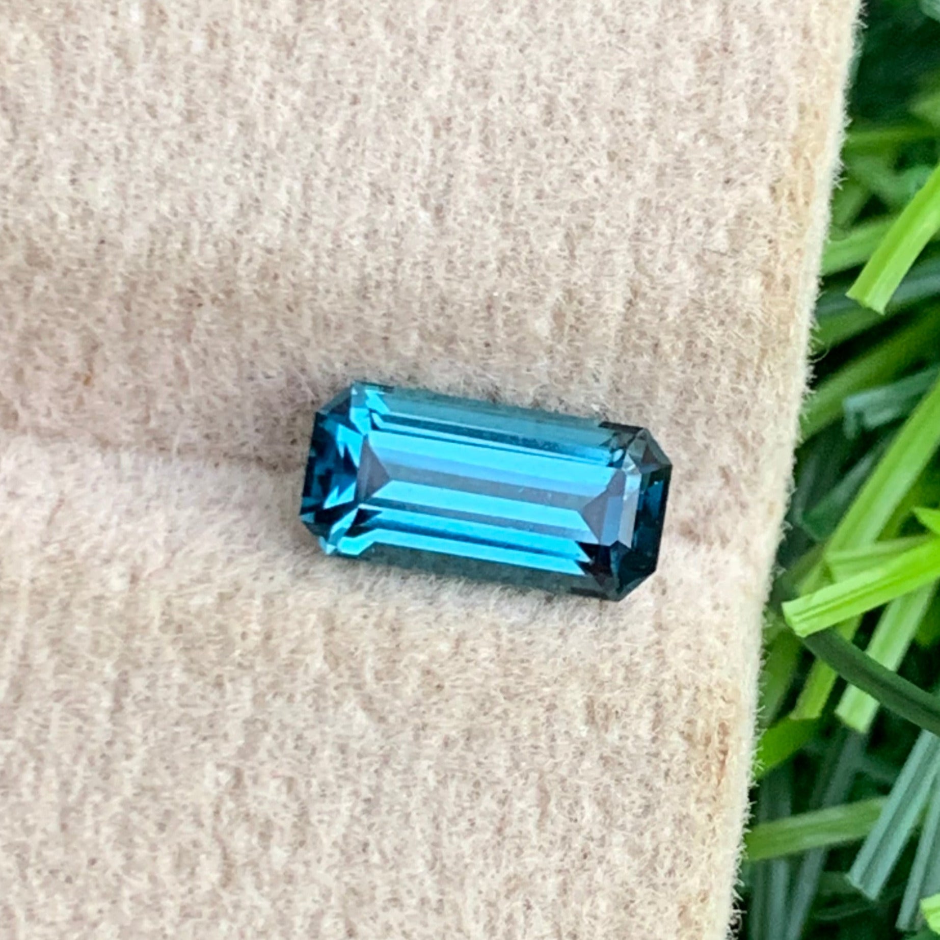 Ink Blue Tourmaline ring
0.80 carat blue tourmaline afghanistan origin loupe clean
emerald cut blue tourmaline deep color close up