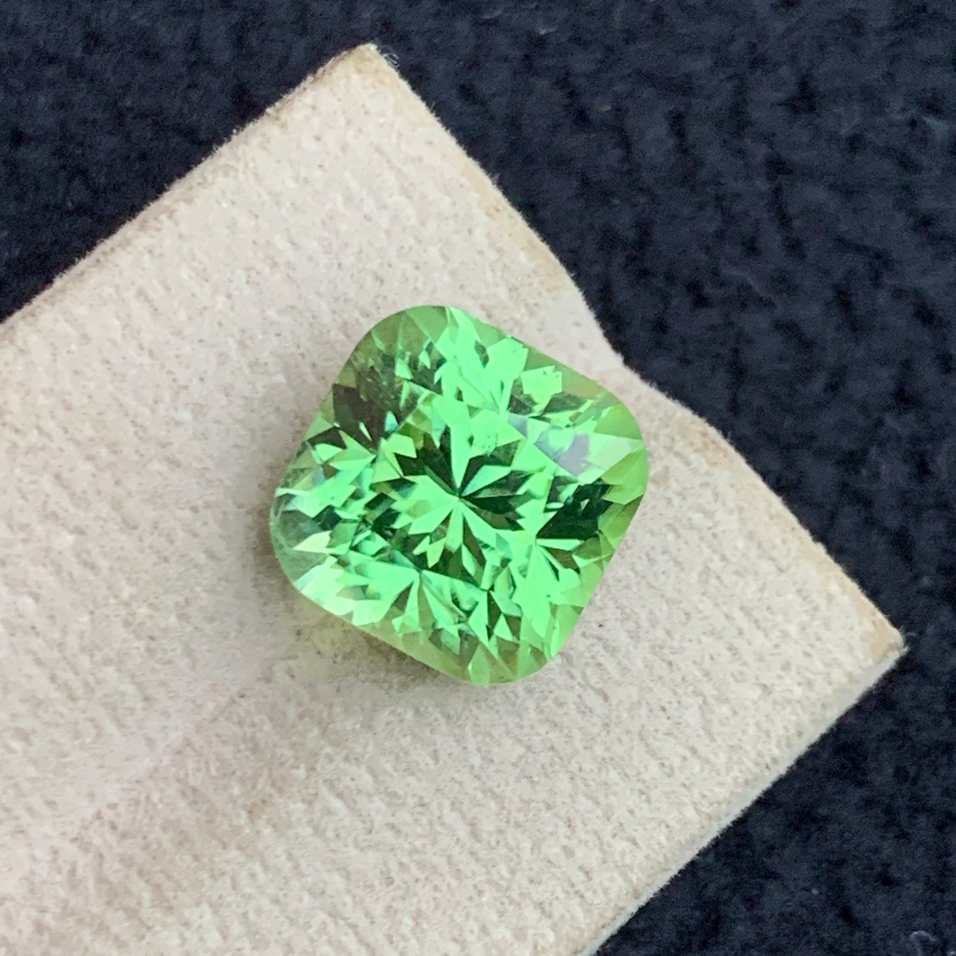 Apple Green Peridot 
Apple Green Peridot jewelry
10.60 carat apple green peridot cushion cut gemstone