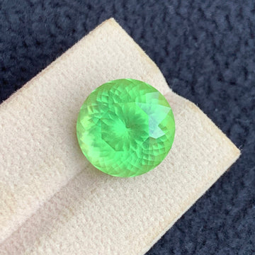 Apple Green Peridot gemstone
Apple Green Peridot jewelry
14.50 carats apple green peridot round brilliant cut gemstone