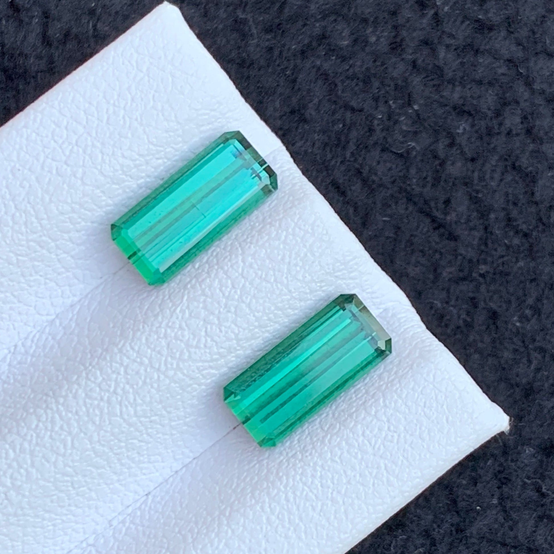 Green Tourmaline Pair
loose green tourmaline earring pair

natural green tourmaline gemstones

emerald cut tourmaline pair