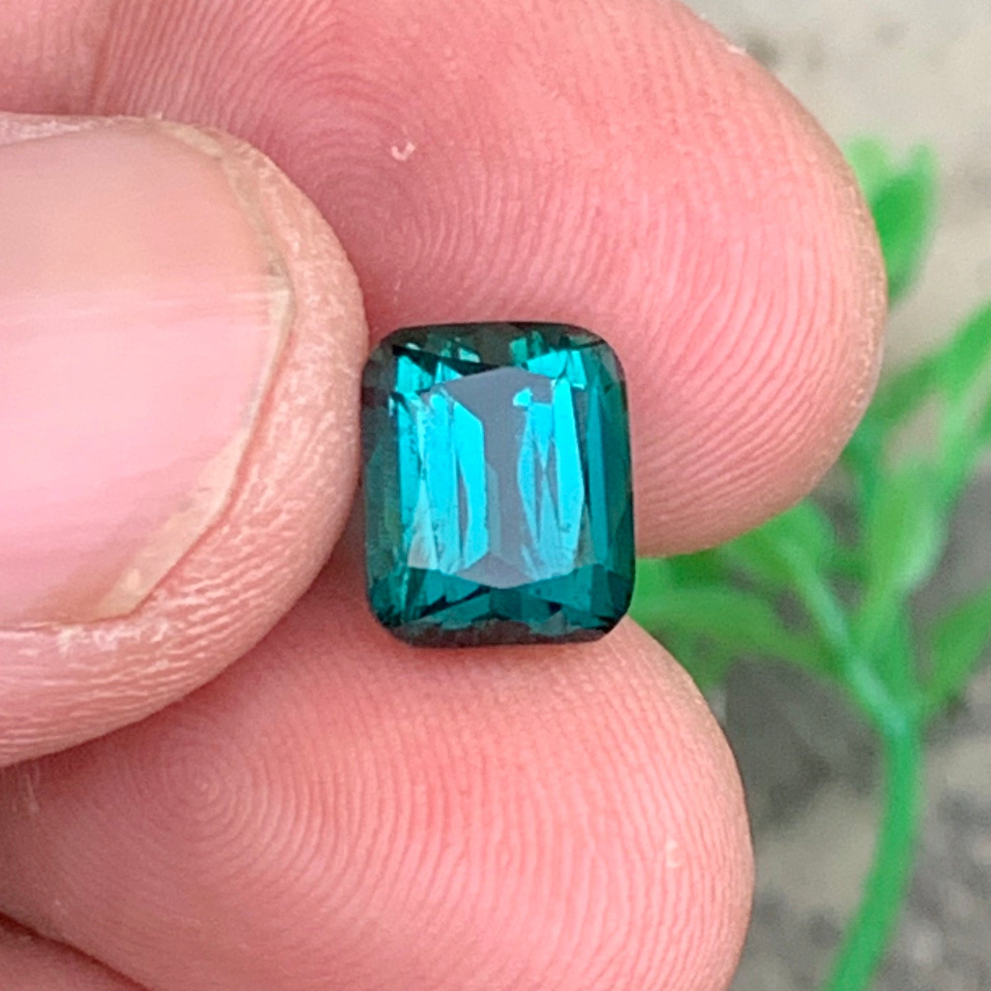 3.90 carats dark lagoon tourmaline cushion cut gemstone