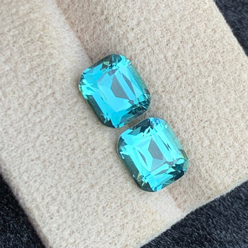 Lagoon Tourmaline pair
4.42 carats natural lagoon tourmaline pair cushion cut Afghanistan OneStep Gems
Lagoon blue green tourmaline earring pair natural gemstones