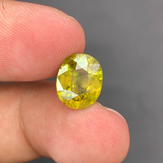 4.45 Carats Natural Sphene Gemstone – Cushion Cut Titanite Stone, Yellow Green from Pakistan