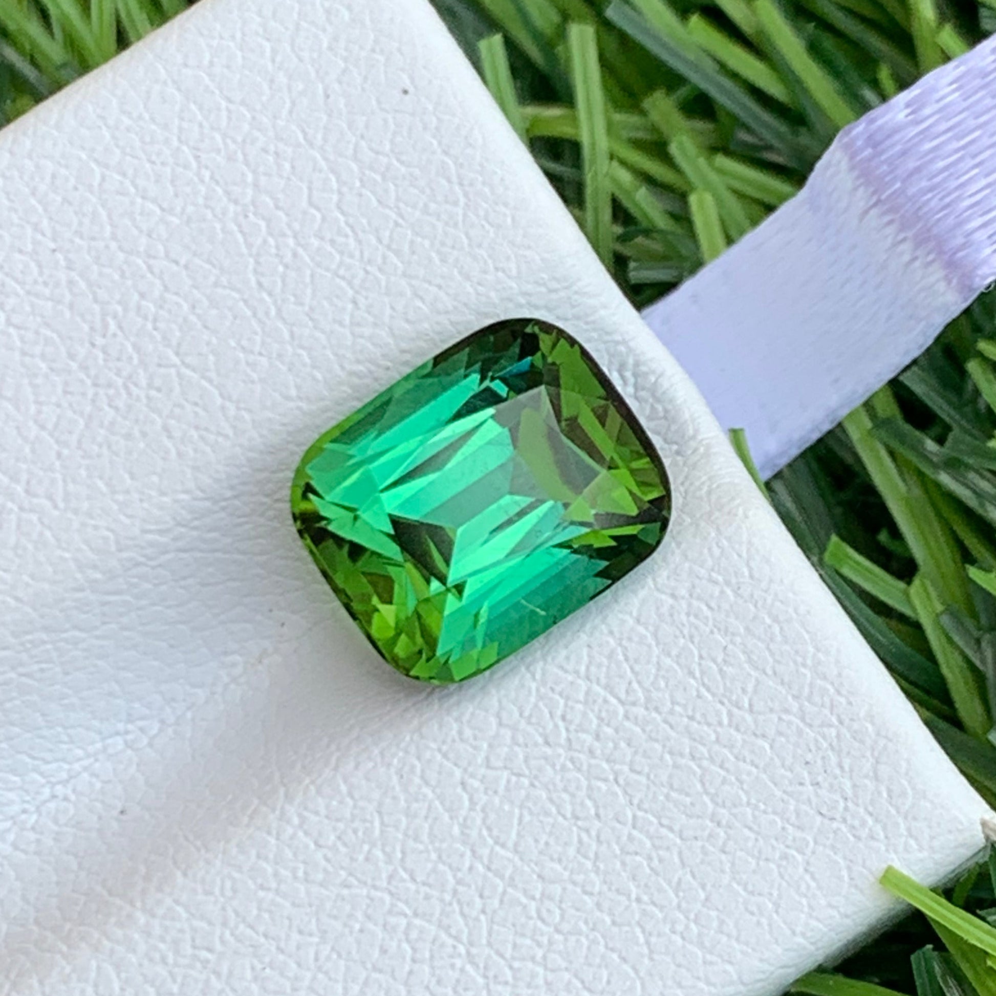 bluish green tourmaline
bright green tourmaline cushion cut

yellow green tourmaline gemstone

natural green tourmaline from Afghanistan