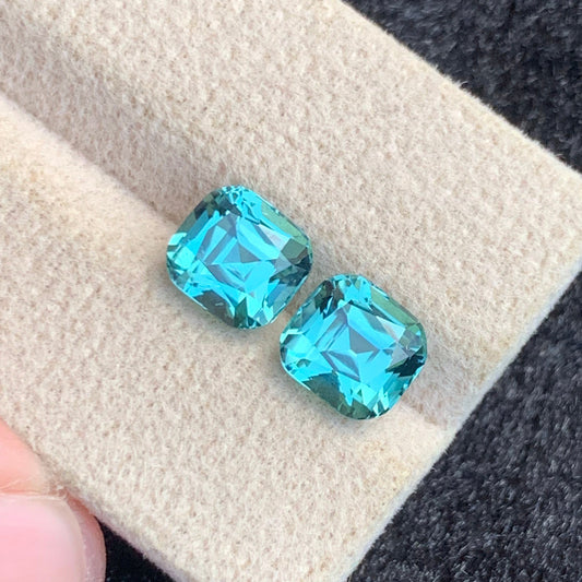 Lagoon Tourmaline Gemstone
Lagoon Tourmaline Jewelry
5.36 carats natural lagoon tourmaline pair cushion cut Afghanistan OneStep Gems