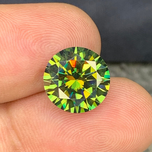 Yellowish Green Moissanite ring
Yellowish Green Moissanite necklace
Yellowish Green Moissanite gift
6.10 carat yellowish green round moissanite gemstone top view
Yellowish green moissanite round brilliant cut 12.15 mm loose stone