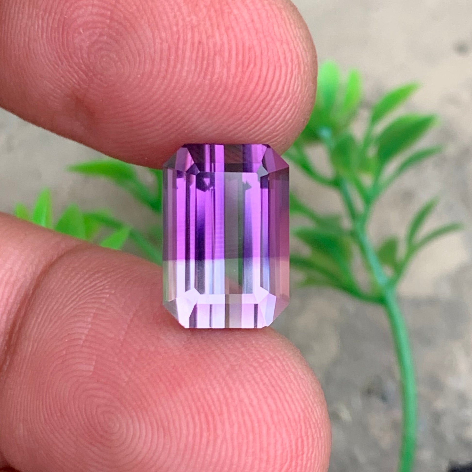 Bicolor Amethyst 
natural bicolor amethyst emerald cut

loose bicolor amethyst from Brazil

untreated bicolor amethyst gemstone
