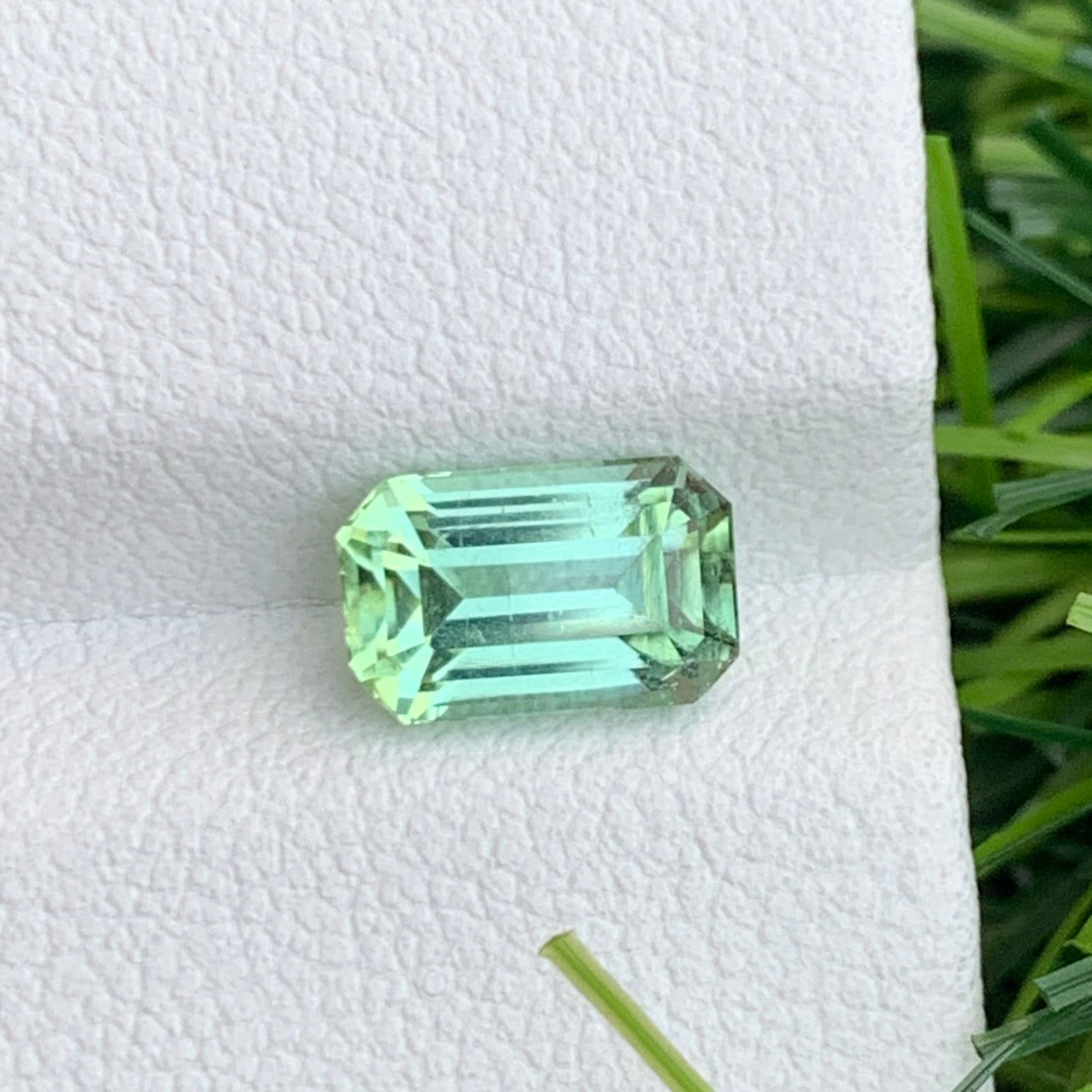 Afghanistan origin tourmaline gemstone emerald cut close up
luxury green tourmaline gemstone for fine jewelry design
