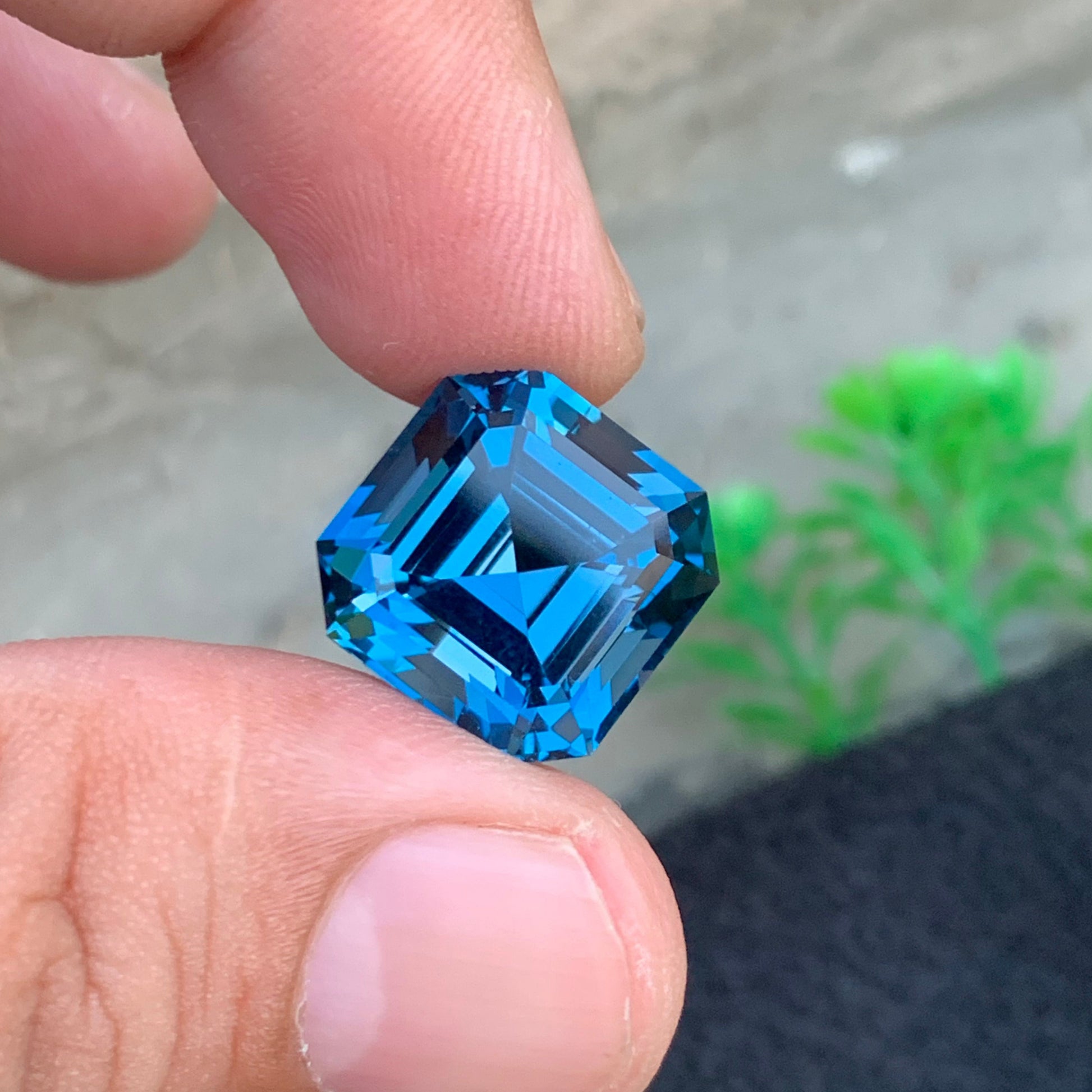African topaz gemstone Asscher cut close up
premium blue topaz gemstone large size loose stone