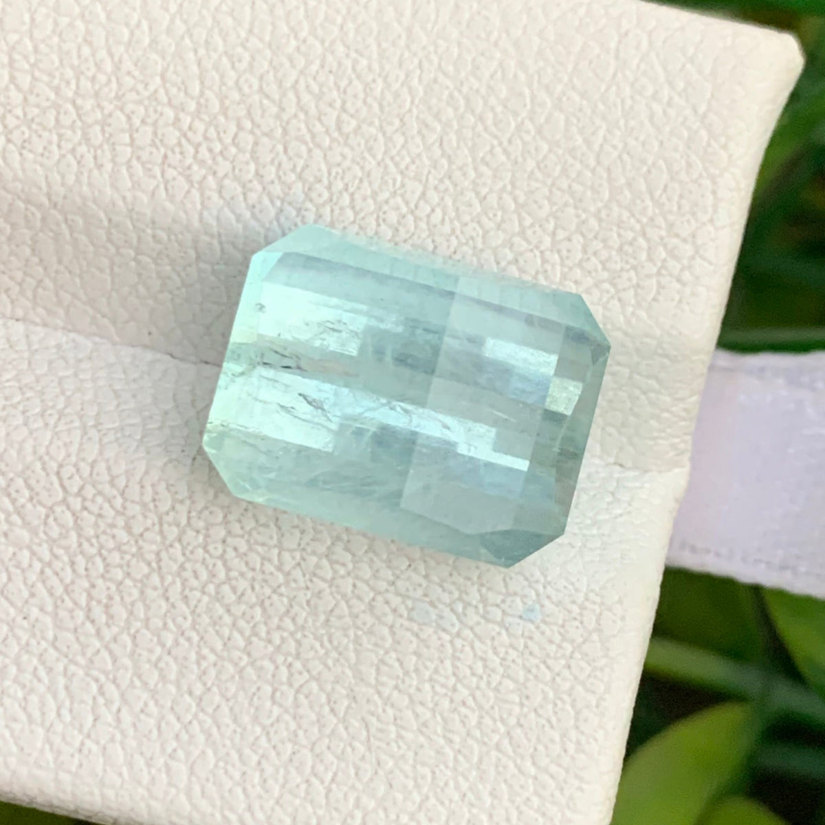 Aquamarine reflecting light showing geometric sparkle
Pakistani aquamarine for statement ring setting