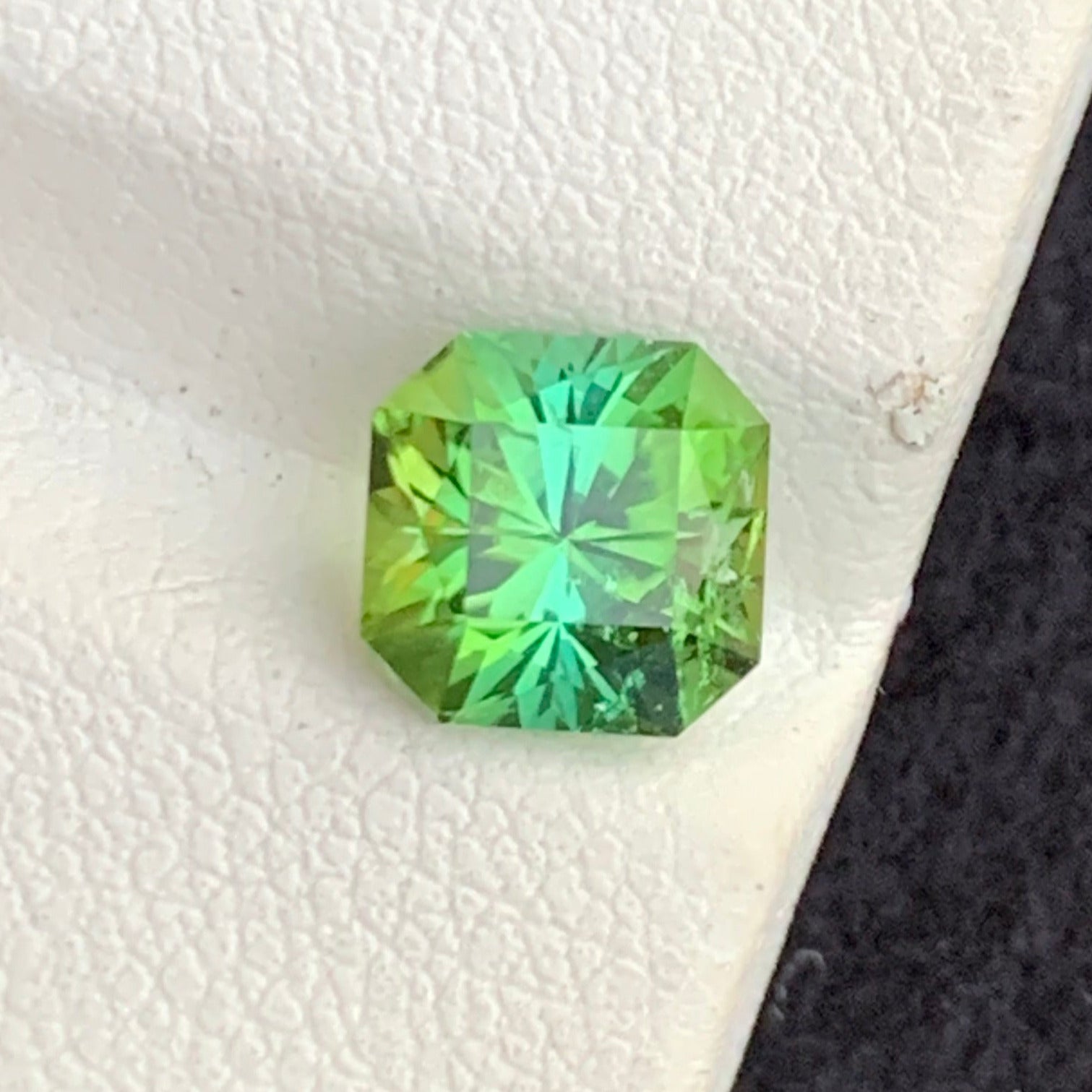 Asscher cut tourmaline stone
Yellow green tourmaline gem