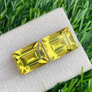  Lemon Quartz earrings
 Lemon Quartz gift
Yellow quartz pair on white background showing symmetry
Baguette cut dimensions 12.45 x 10.70 x 9.06mm
