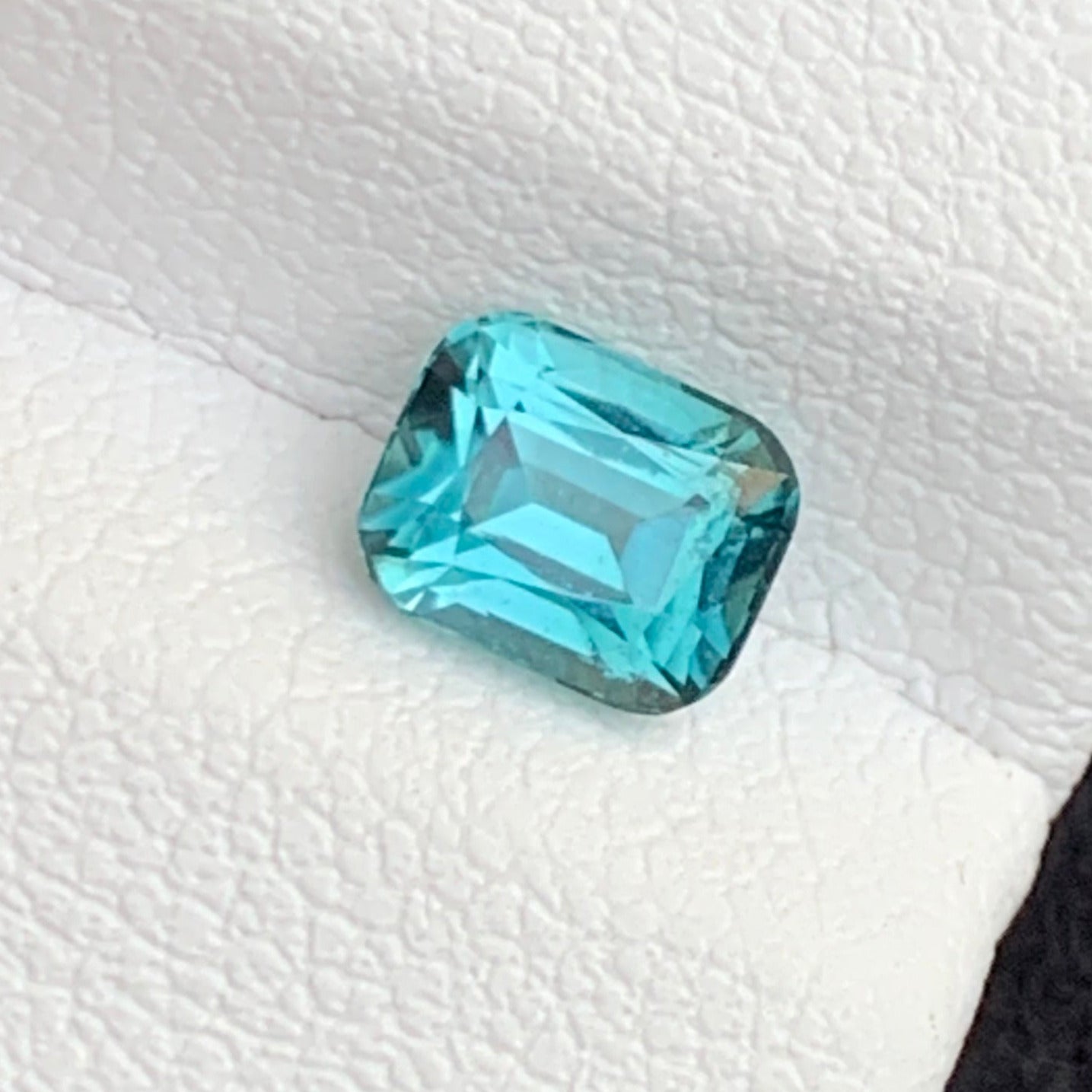 Bluish green tourmaline 0.90 ct
Cushion cut lagoon tourmaline loose stone