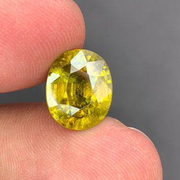 4.45 Carats Natural Sphene Gemstone – Cushion Cut Titanite Stone, Yellow Green from Pakistan