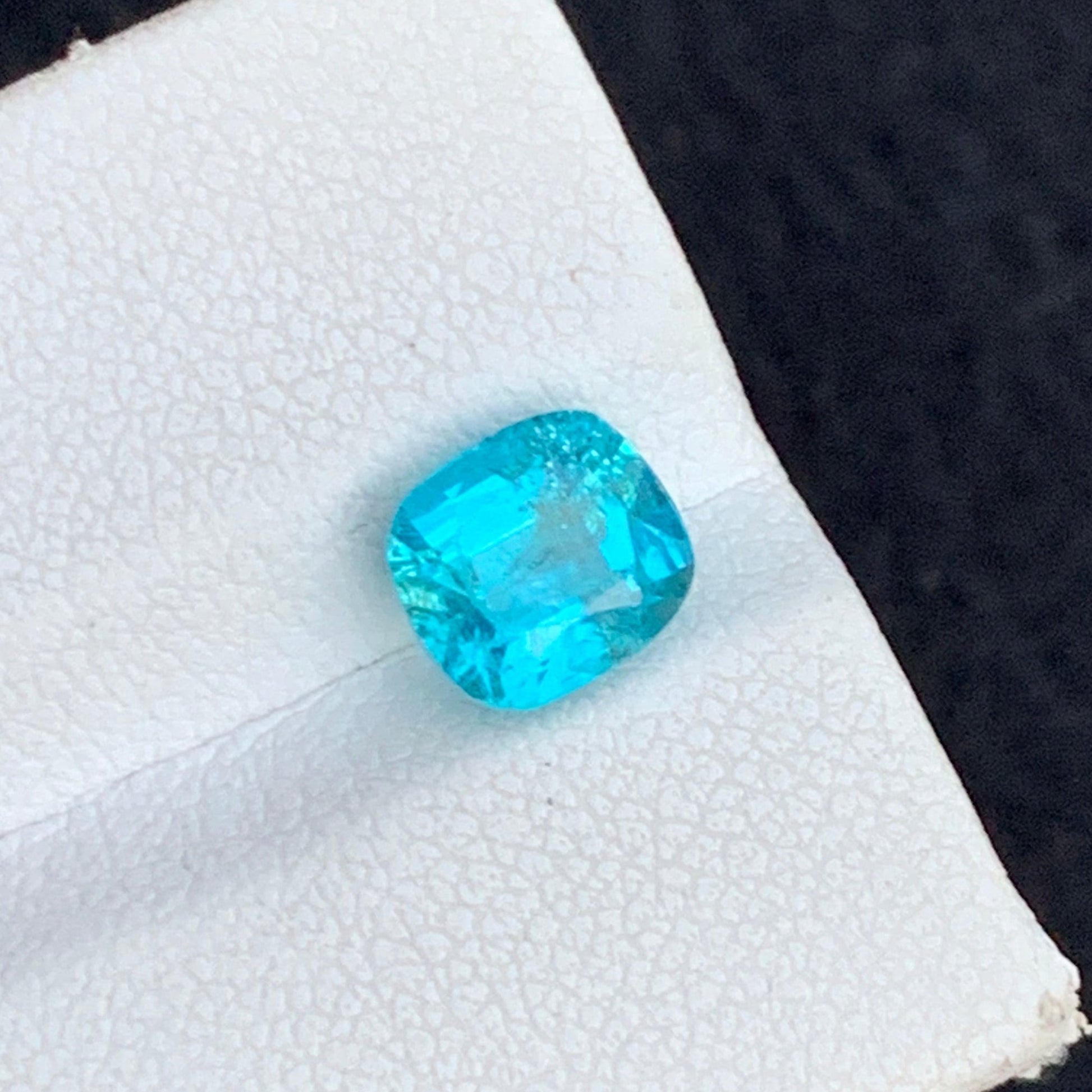 Paraiba Tourmaline
Cushion Cut Blue Apatite Gemstone Close-Up