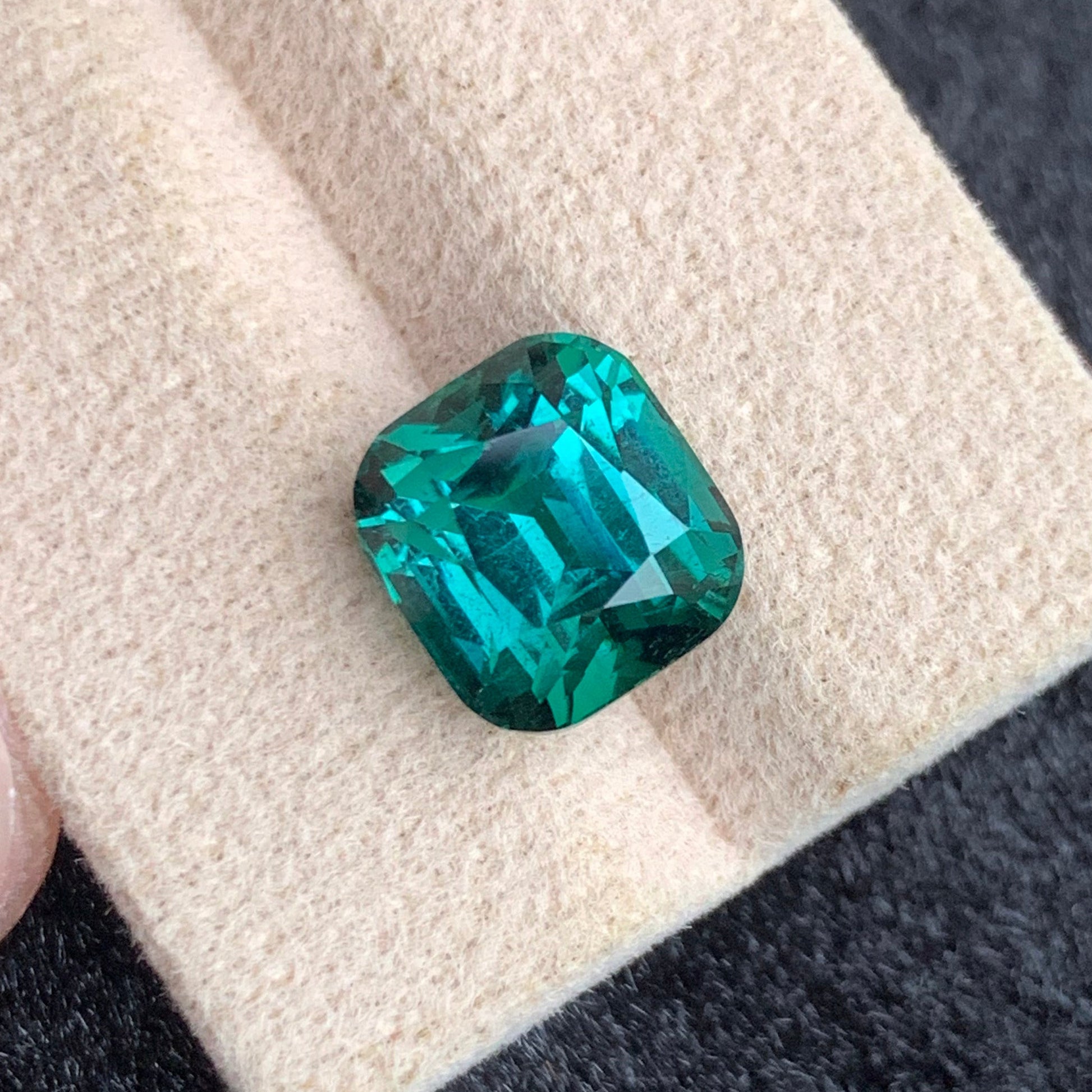 Cushion cut bluish green tourmaline gemstone from OneStep Gems
Rare Afghan lagoon tourmaline gemstone with vibrant blue green color