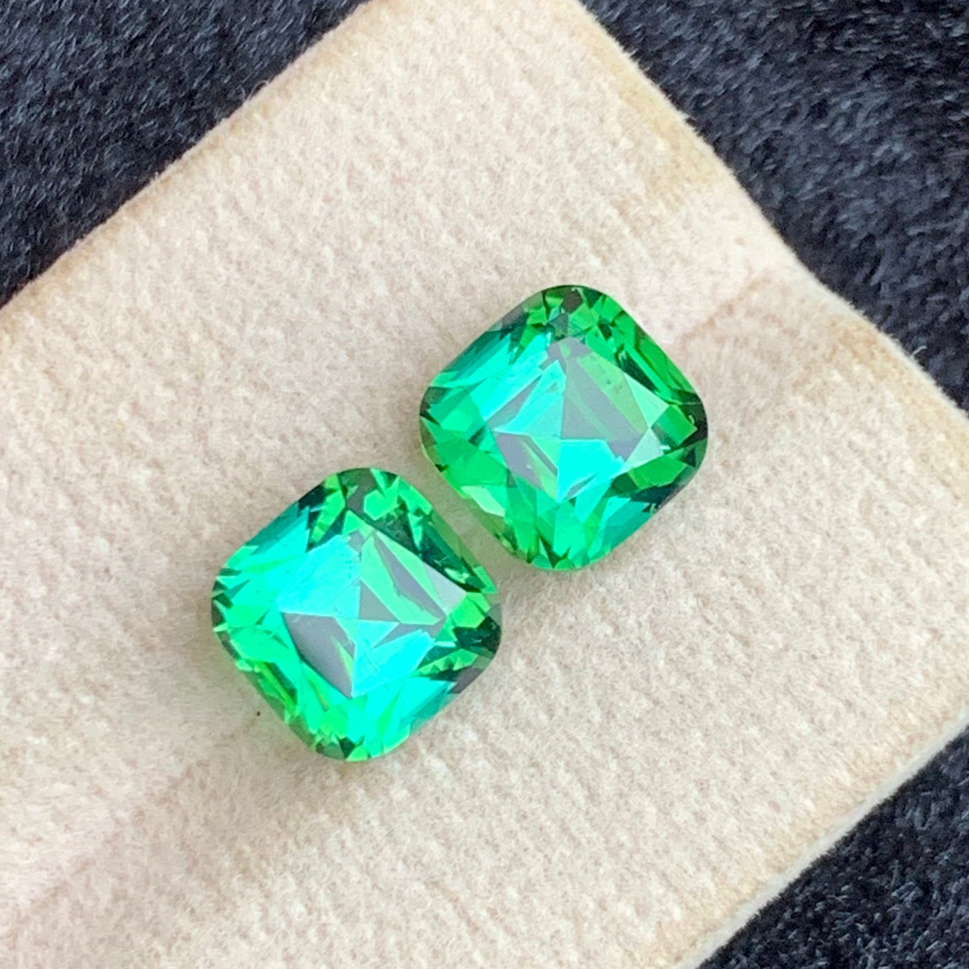 Cushion cut bluish green tourmaline loose gemstones
Eye clean Afghan tourmaline pair close-up