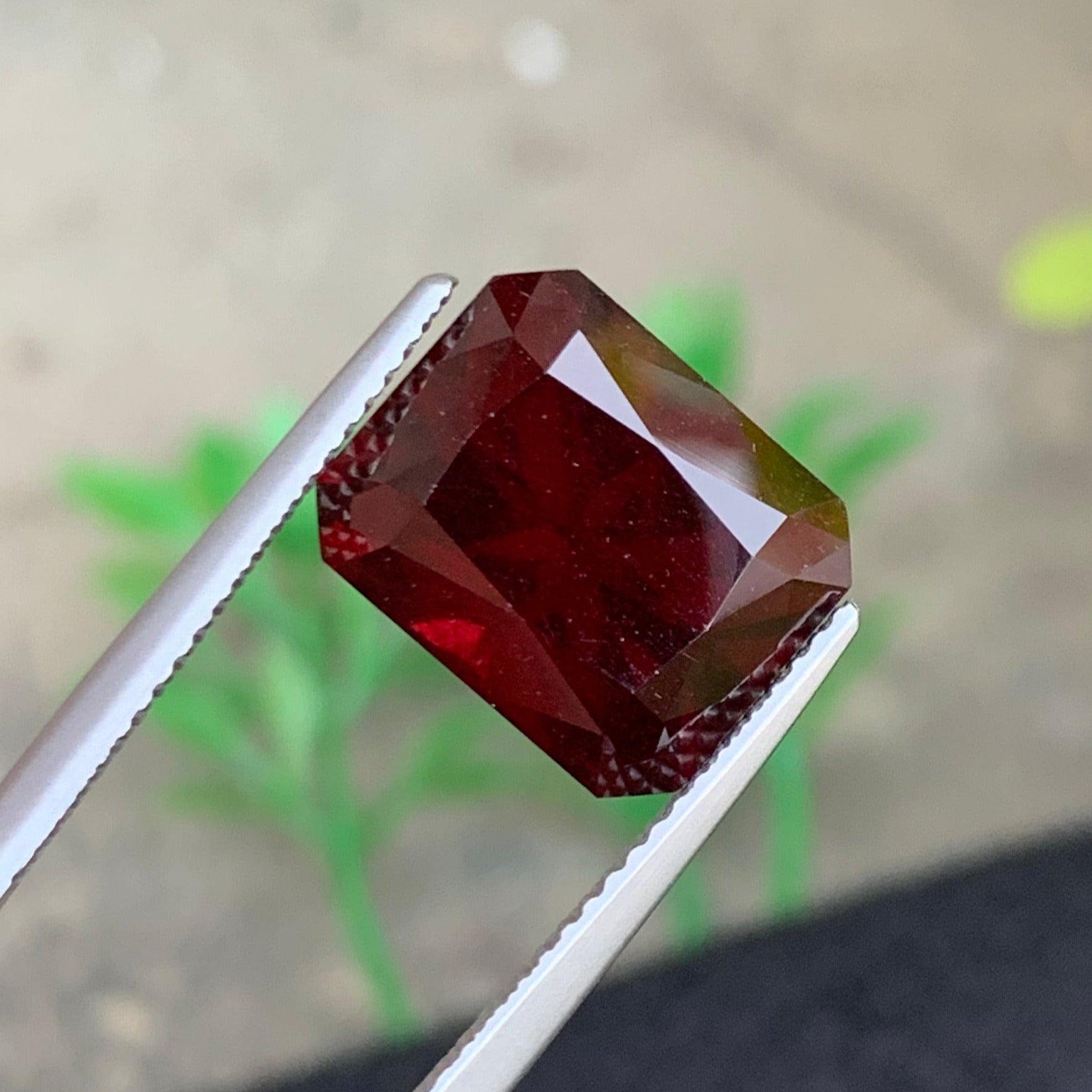 Deep red cushion cut gem
Onestep Gems rhodolite garnet