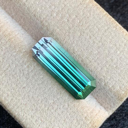 Bicolor Tourmaline Gemstone
Bicolor Tourmaline Jewelry
Bicolor Tourmaline gift
Emerald cut bicolor tourmaline gemstone close-up
VVS Afghan tourmaline 4.95 carats loose stone
