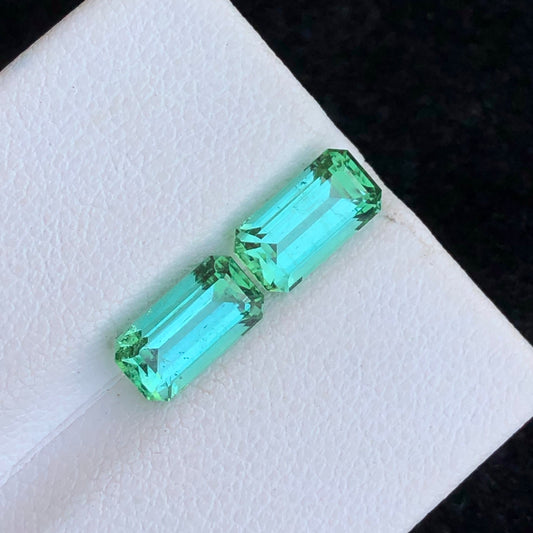 Emerald cut bluish green tourmaline pair from Onestep Gems