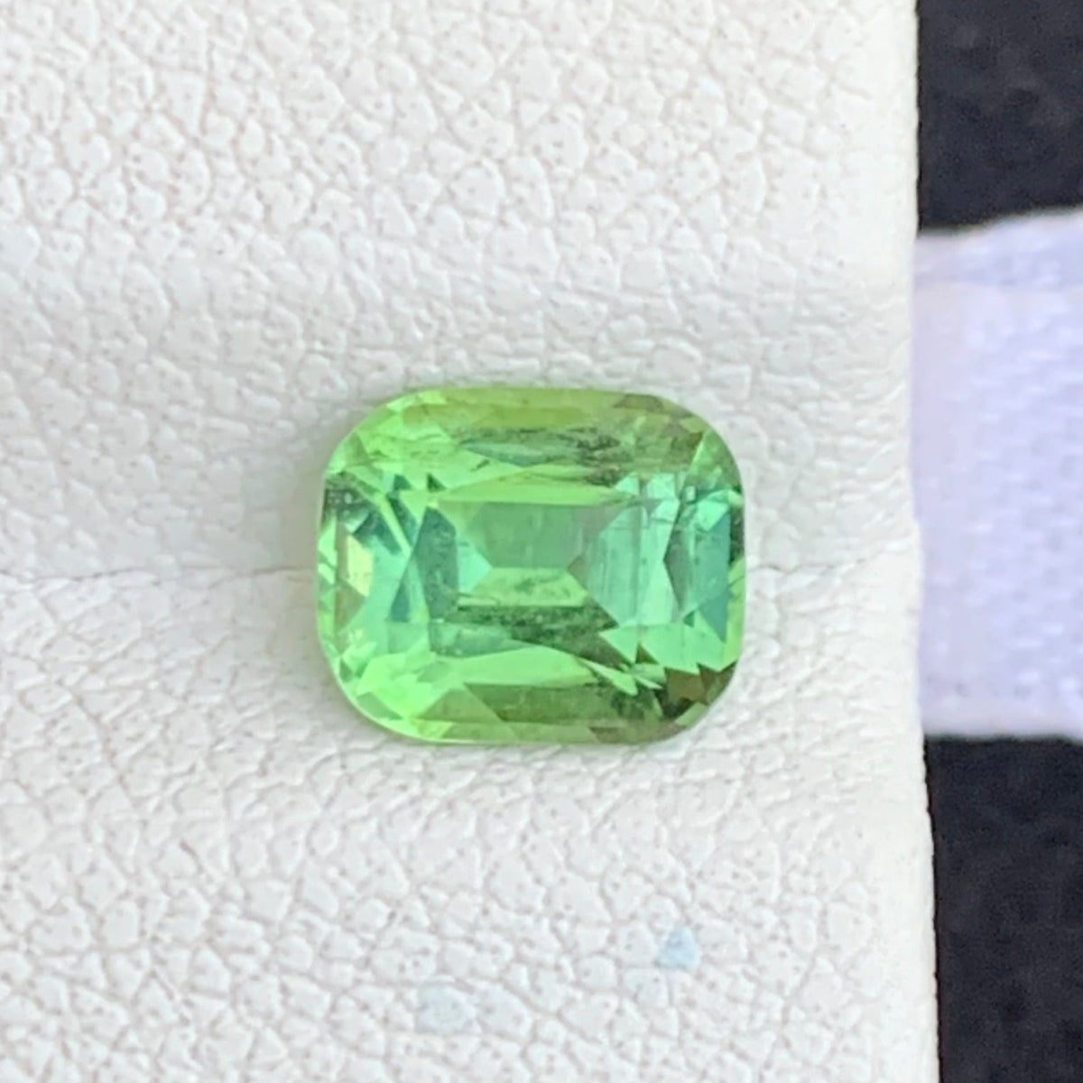 Forest Green Tourmaline
Forest Green Tourmaline jewelry
Forest Green Tourmaline ring
Cushion cut tourmaline side profile showing brilliance
Forest green tourmaline VVS clarity close-up