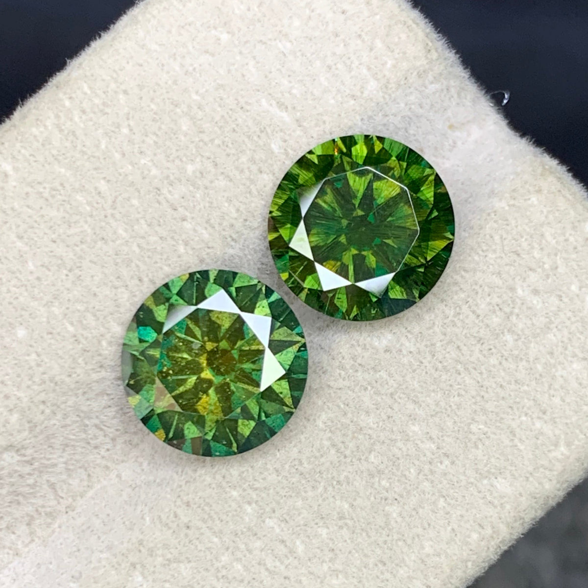  Green Moissanite
 Green Moissanite pair
Green moissanite pair 4.95 carat round cut gemstones
Lab grown green moissanite matched pair