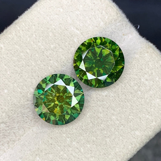  Green Moissanite
 Green Moissanite pair
Green moissanite pair 4.95 carat round cut gemstones
Lab grown green moissanite matched pair