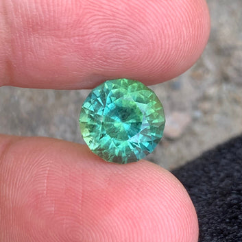 6.15 Carats Bluish Green Tourmaline Gemstone with Perfect Round Shape from Afghanistan