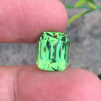 10.34 Carats Apple Green Peridot Gemstone with Cushion Shape from Pakistan