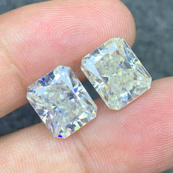 Long cushion cut moissanite pair side profile
White moissanite pair showing clarity close-up