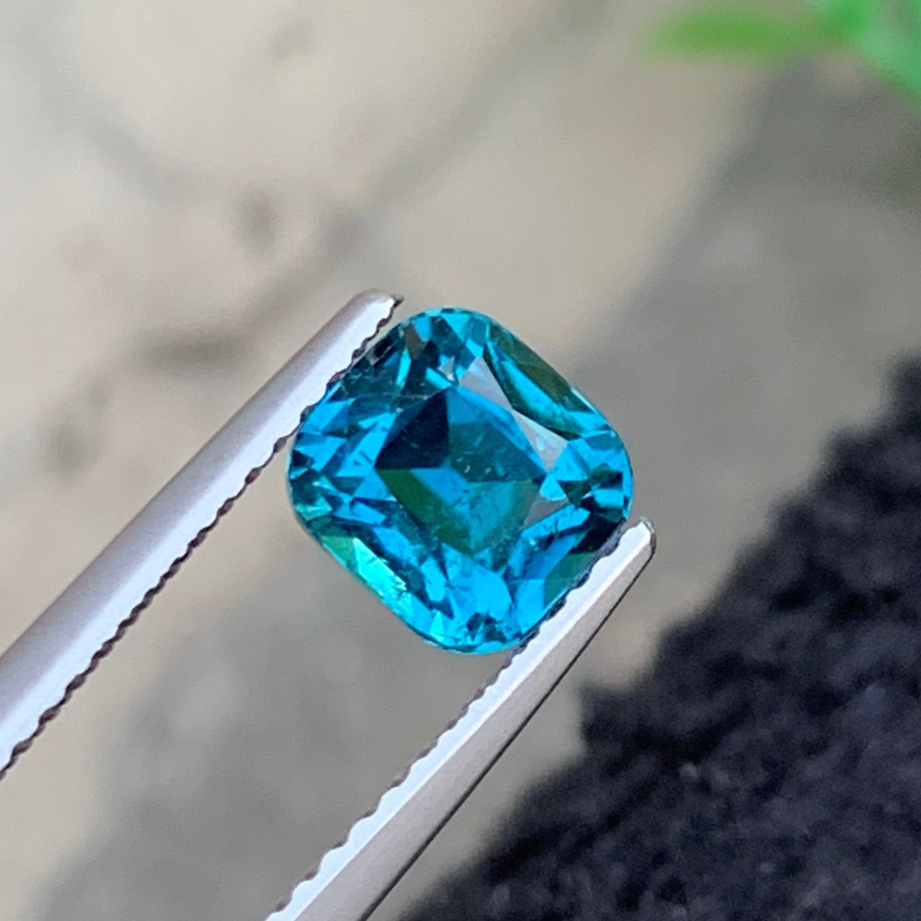Natural Afghan vivid blue tourmaline loose gemstone
Cushion cut vivid blue tourmaline close-up