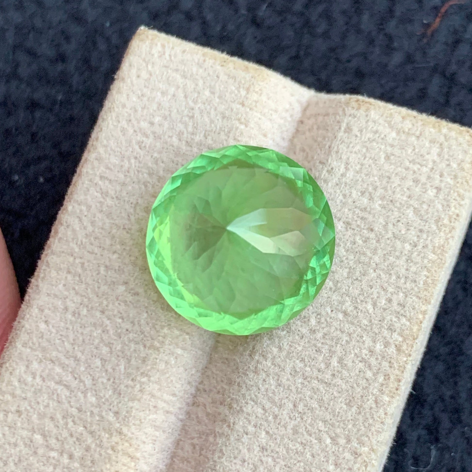 Natural untreated peridot gemstone close up
Large round peridot for statement ring design
OneStep Gems natural apple green peridot