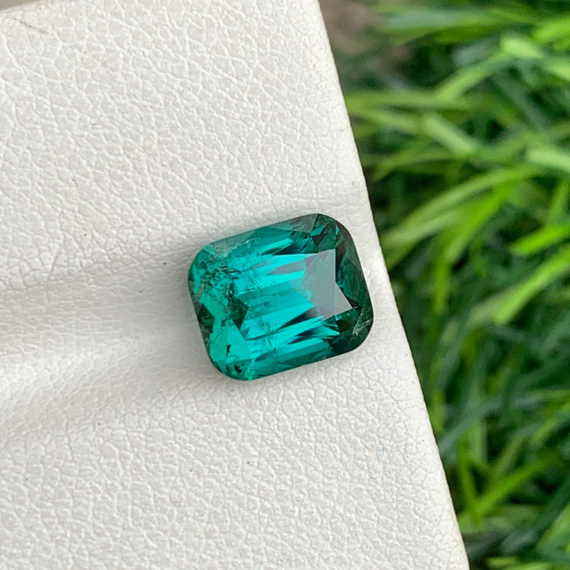 Onestep Gems Bluish Green Tourmaline in Hand
