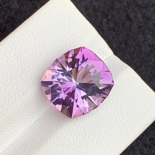 Pink purple amethyst fancy cushion cut gemstone

8.35 carat Brazilian amethyst gemstone