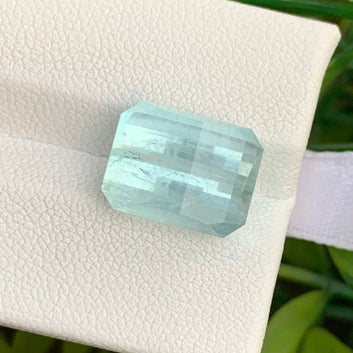 Pixel cut aquamarine side profile showing brilliance
Icy blue aquamarine slightly included clarity close-up