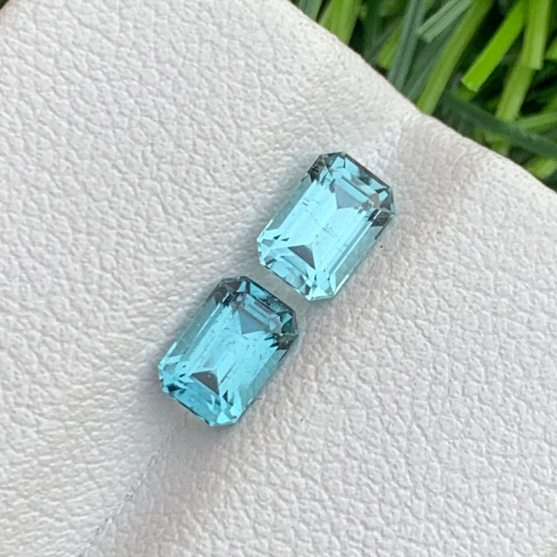 Rare neon blue tourmaline emerald cut stones
Custom jewelry blue tourmaline pair
