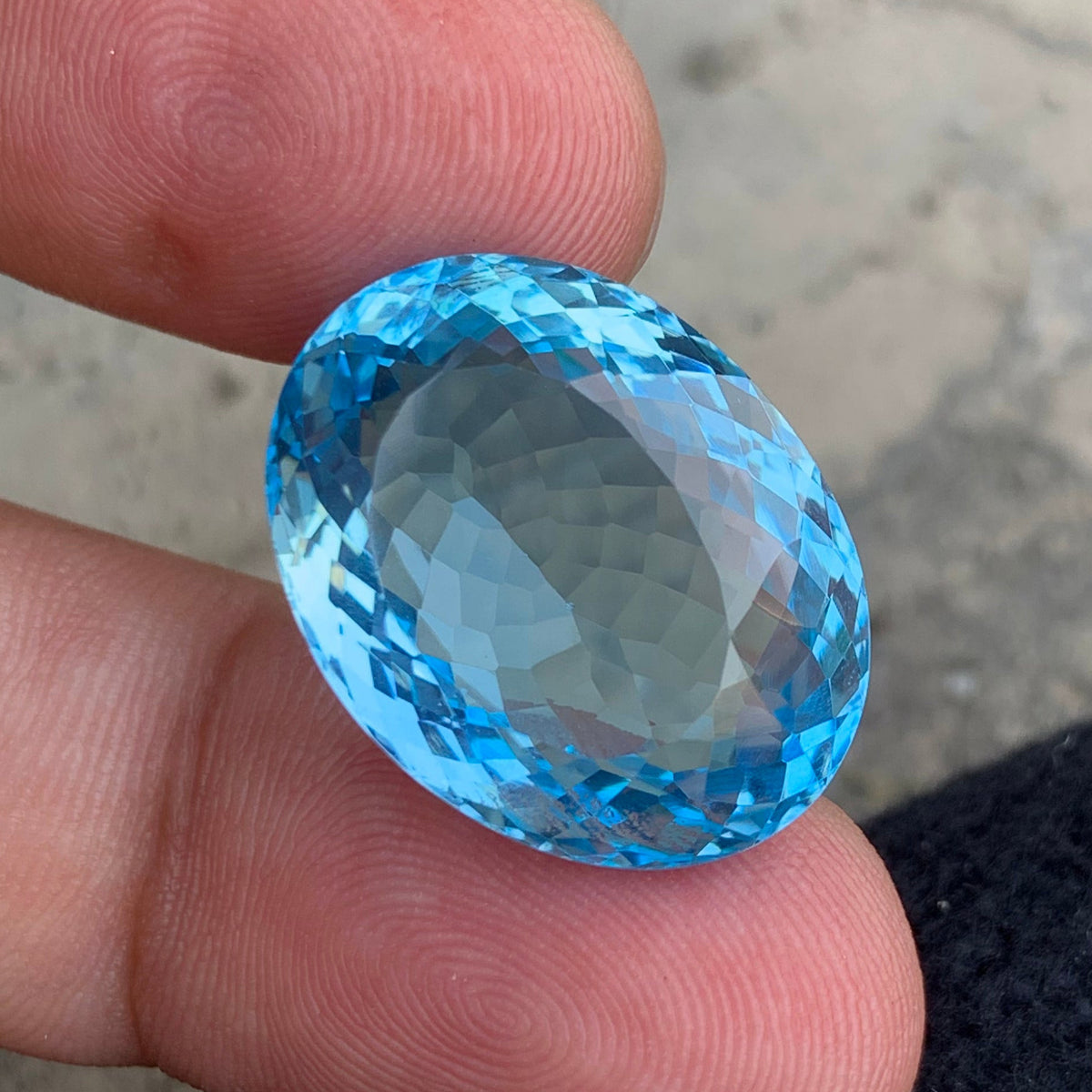 Swiss Topaz 
Swiss Topaz jewelry
Swiss Topaz ring
Swiss blue topaz 34.95 carat laser cut gemstone
Large Swiss blue topaz from Africa, top view