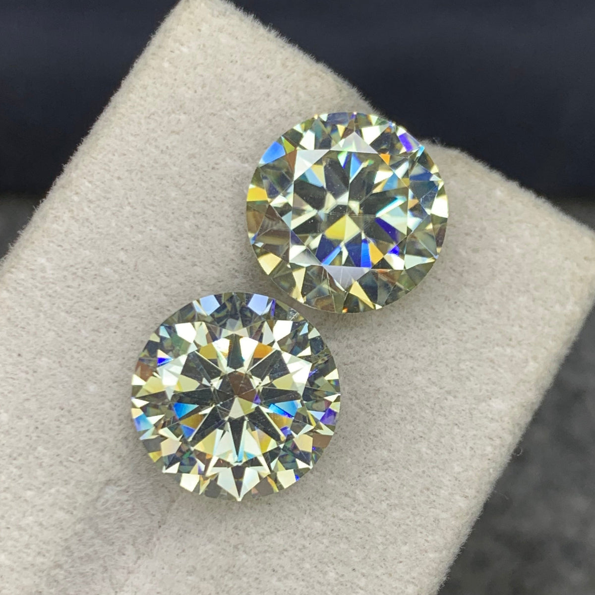 White moissanite pair on white background showing symmetry
Round cut dimensions 12.08 x 12.08 x 7.02mm