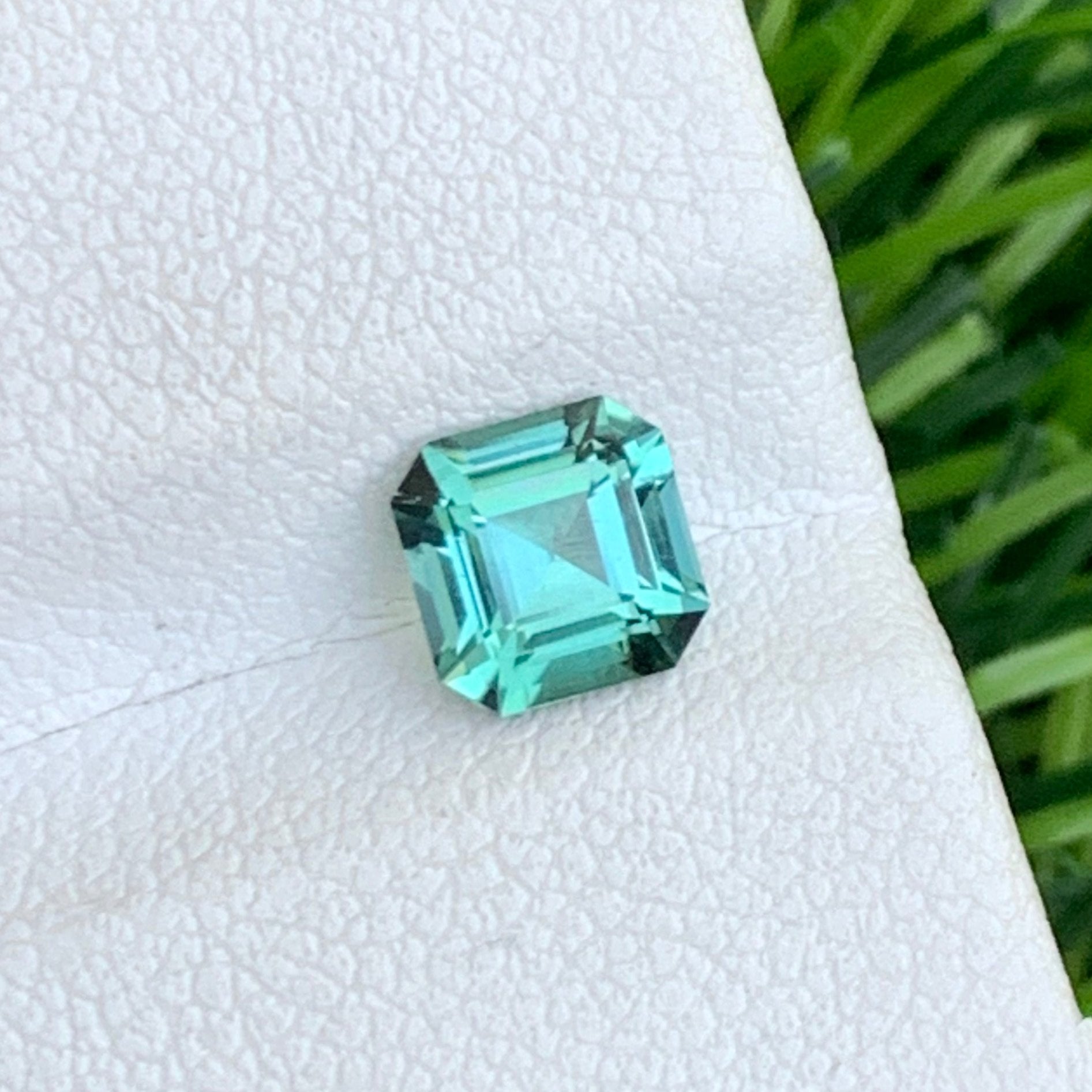 Bluish green Gemstone
asscher cut tourmaline 0.95ct loup clean