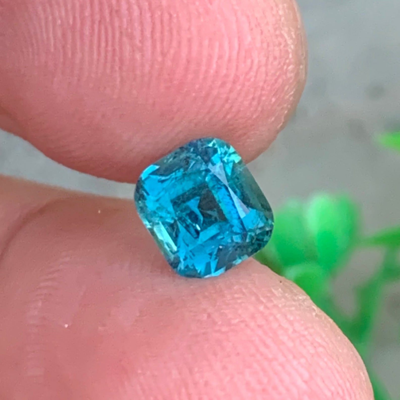 blue green tourmaline gemstone macro detail high clarity
Afghanistan tourmaline gemstone cushion cut close up