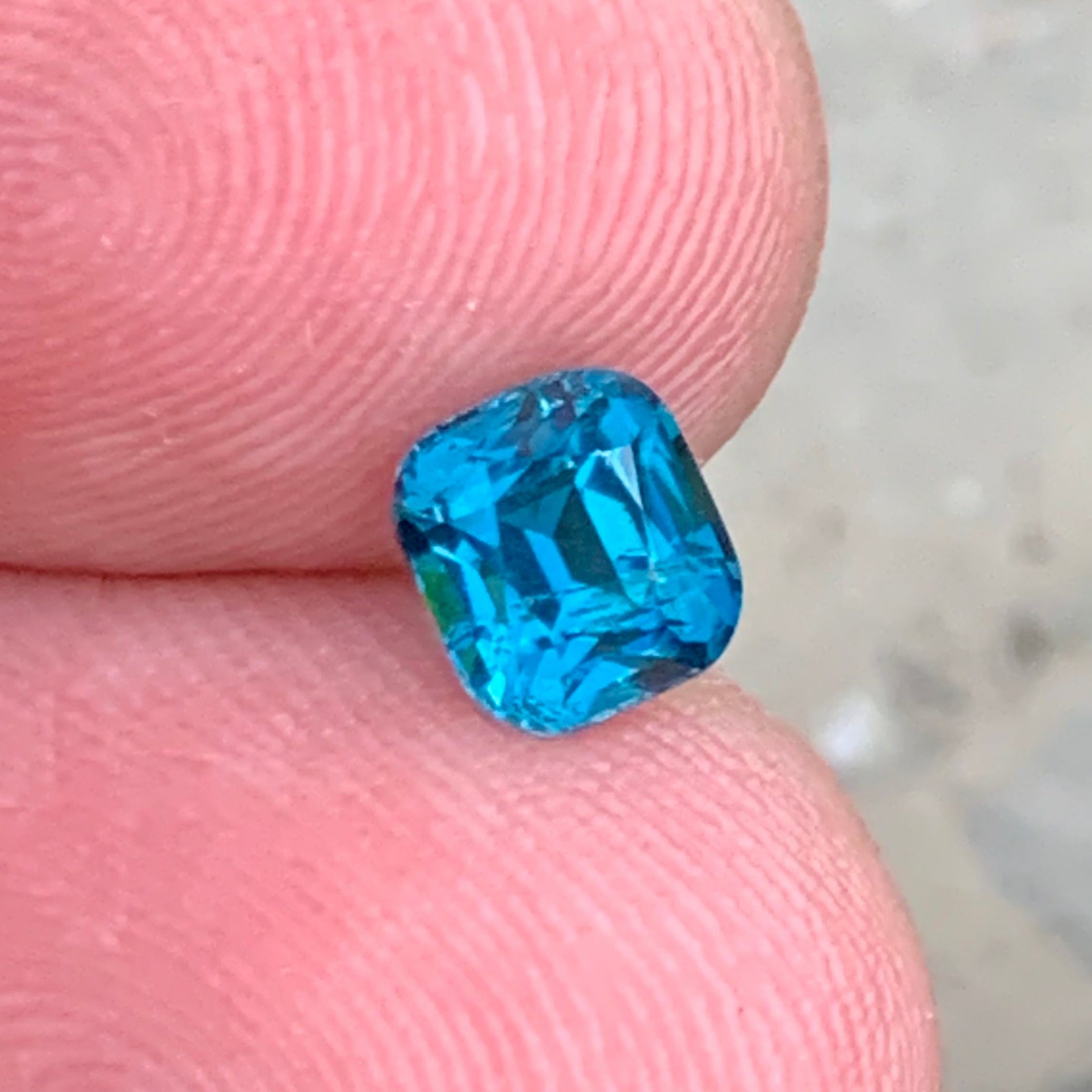 Vivid Blue Tourmaline ring
Vivid Blue Tourmaline pendant
Cushion cut vivid blue tourmaline close-up
VVS blue tourmaline gemstone Afghanistan