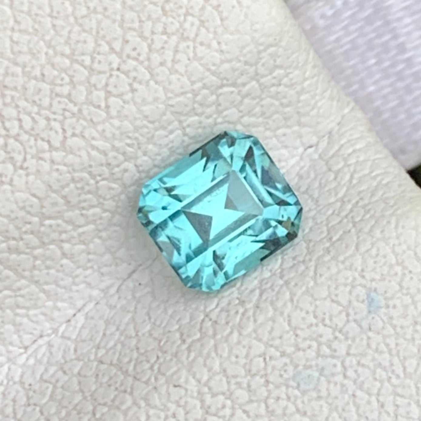  Lagoon Tourmaline Gemstone
bluish green lagoon tourmaline gemstone
cushion cut lagoon tourmaline stone