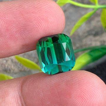 bluish green tourmaline 9.42 carats
bicolor tourmaline cushion cut Afghanistan