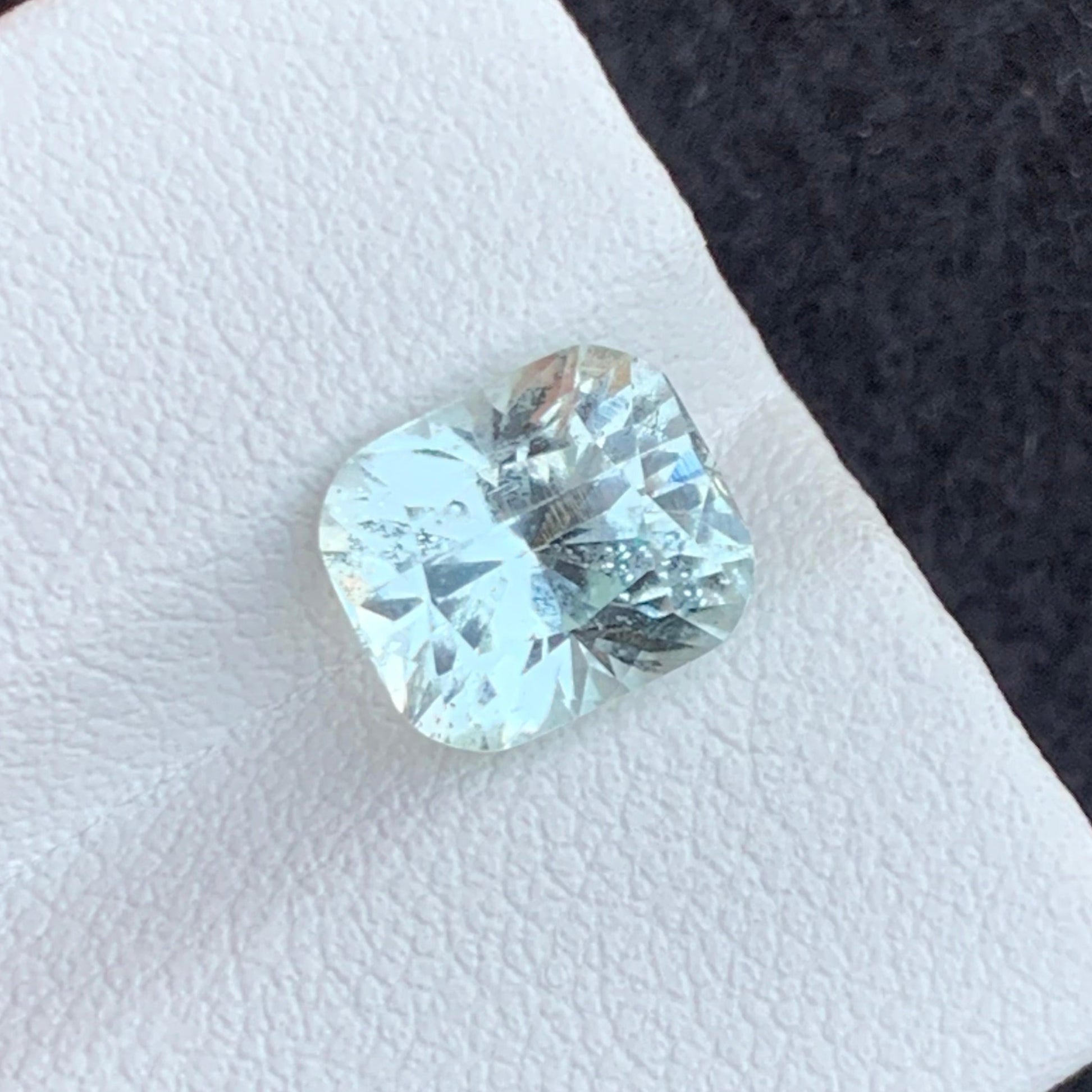 cushion cut achroite tourmaline clear gemstone close up
rare achroite tourmaline 2.70 carat transparent gemstone