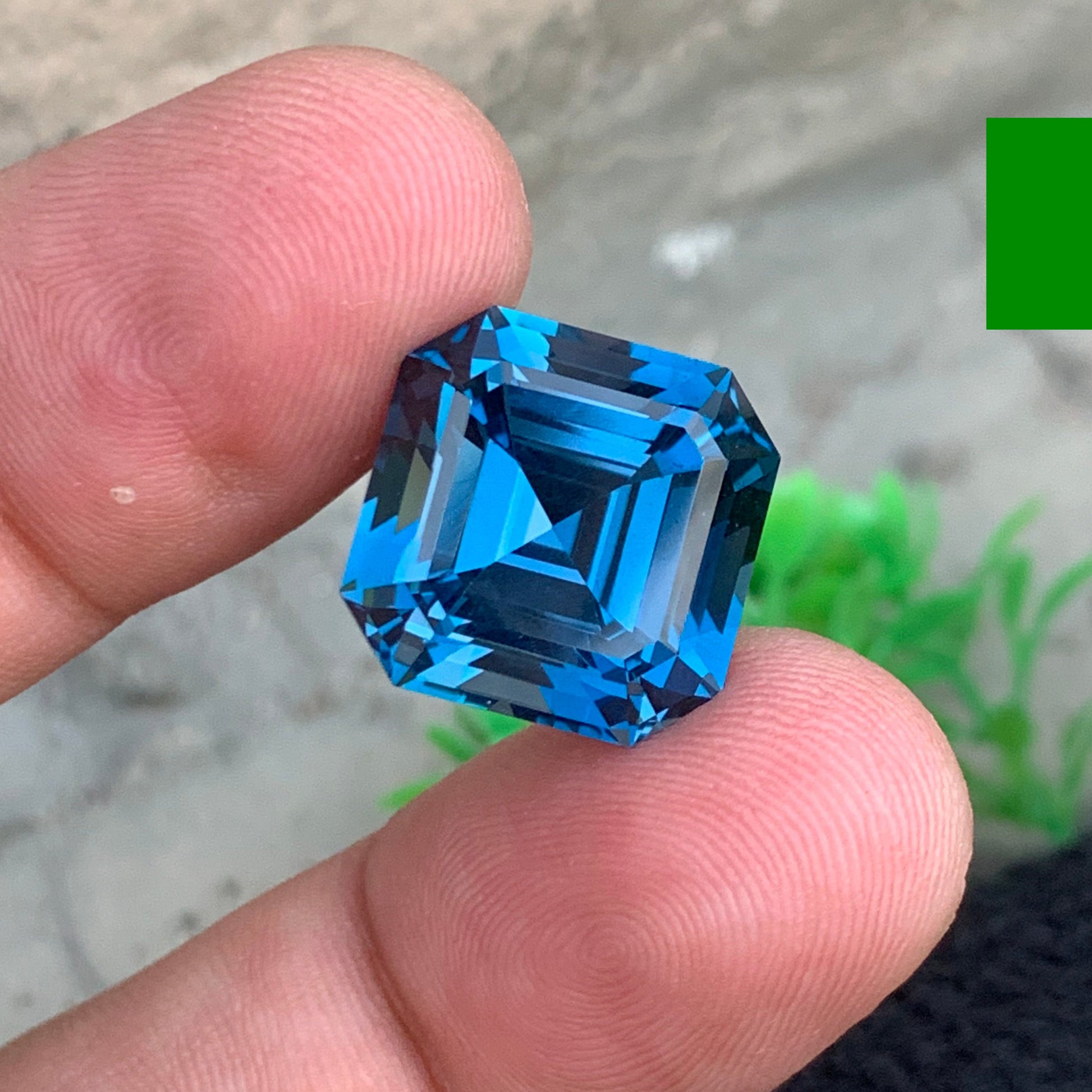 elegant blue topaz gemstone Asscher cut detail