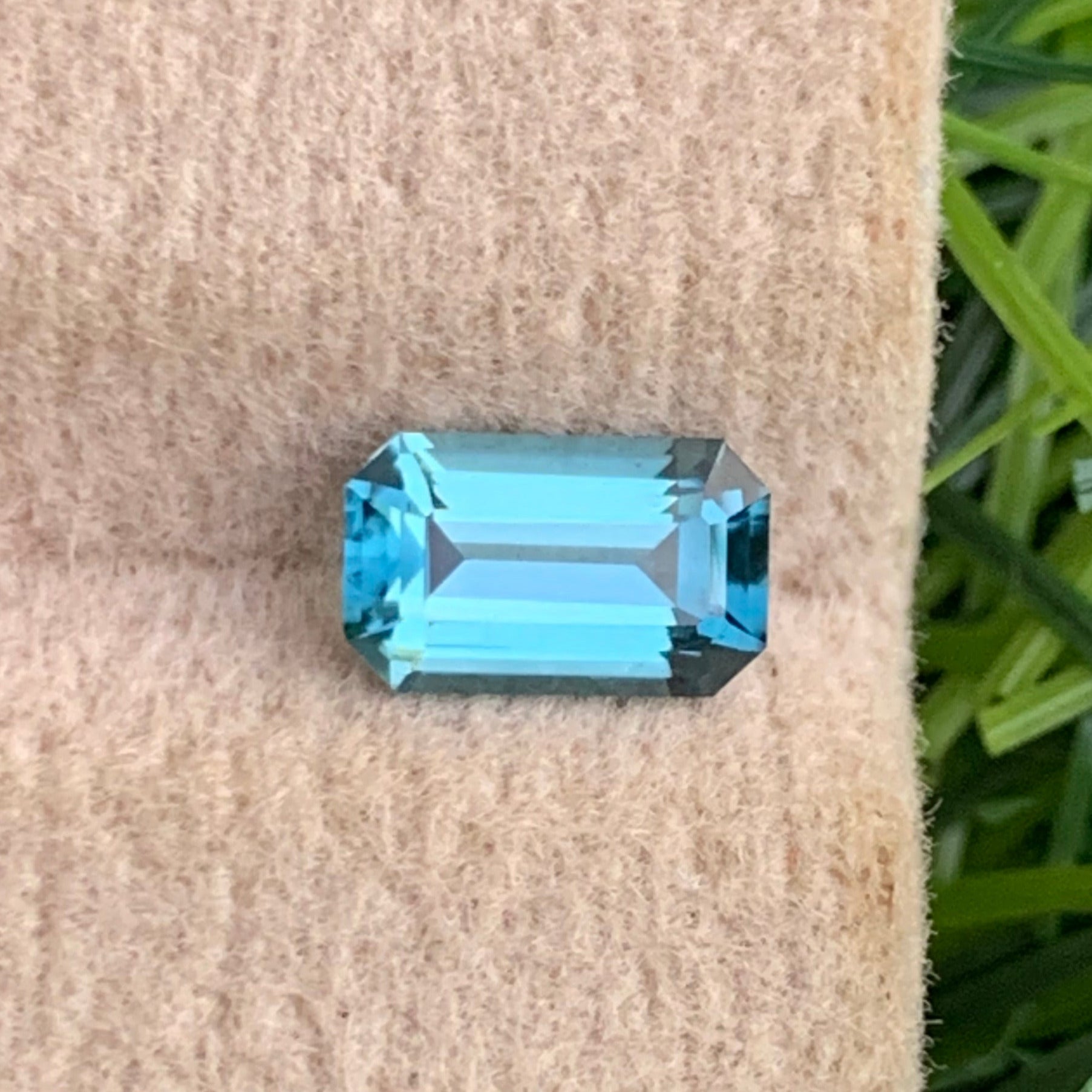 Neon Blue Tourmaline ring
emerald cut blue tourmaline loose gemstone vibrant color
neon blue tourmaline 0.60 carat jewelry stone detail